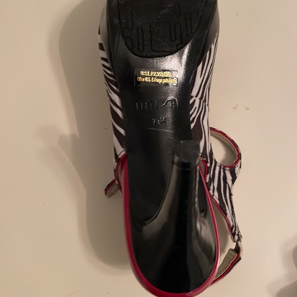 WORN ONCE- Cool zebra print heels with red patent leather border and toe. - Picture 2 of 6